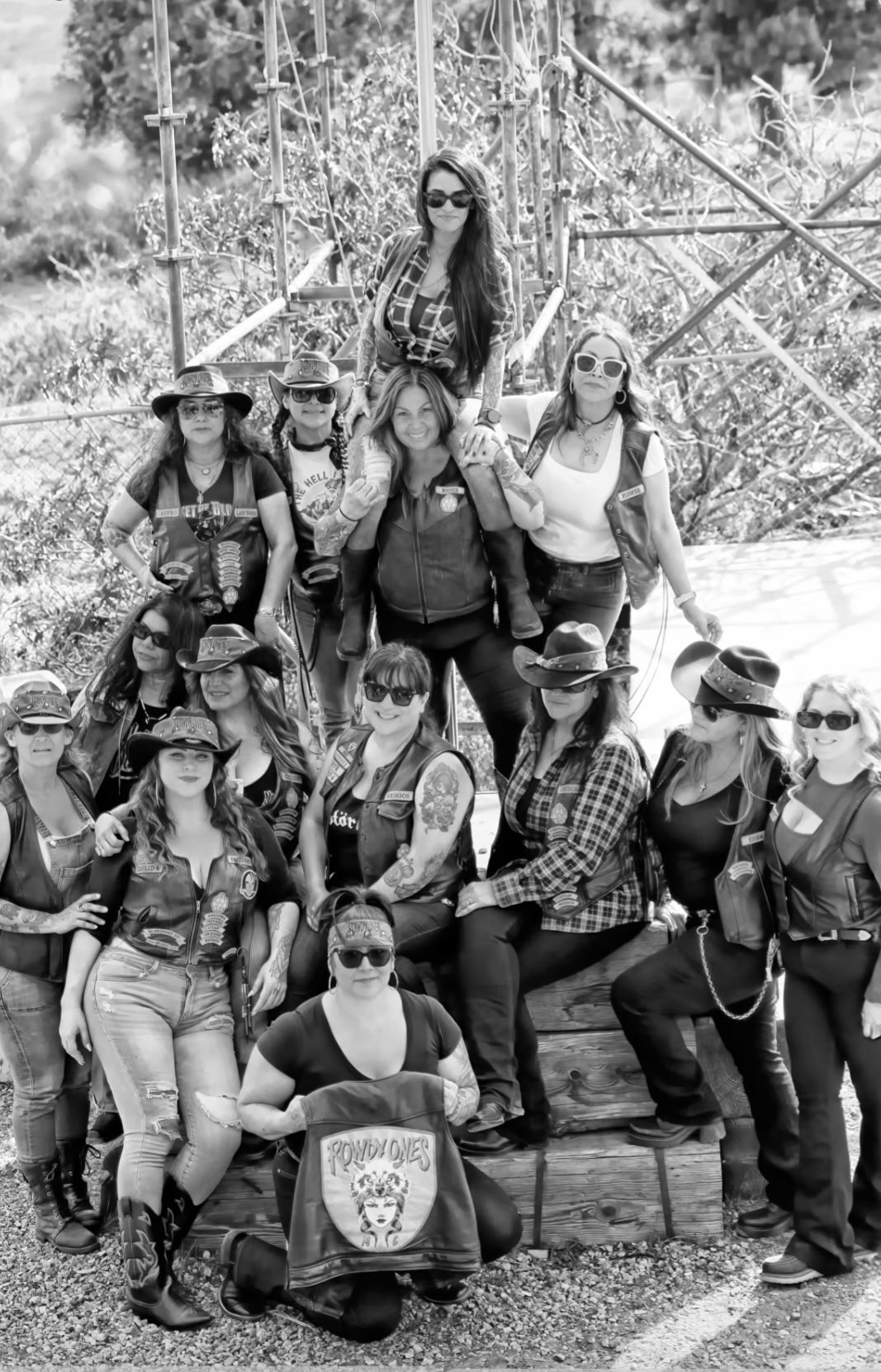 Rowdy Ones MC, the all-women motorcycle club that presents Heels & Wheels, gathered for a club photograph